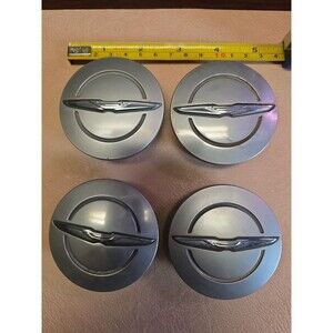 Chrysler Wheel Center Caps Set Of 4 Part# 1LB74TRMAB